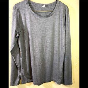 Not sure what label as it has faded. Size L grey athletic shirt